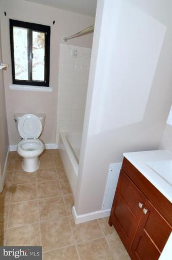 7914 Orange Plank Road Springfield, VA 22153 - Photo 4 of 9 a bathroom with a toilet
