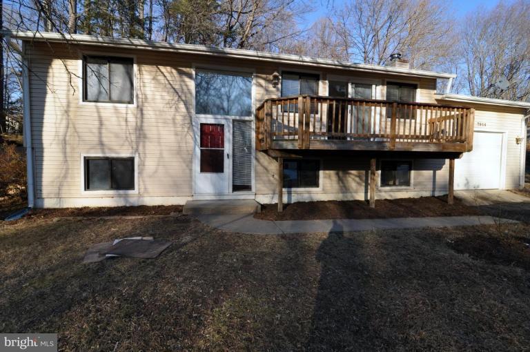 7914 Orange Plank Road Springfield, VA 22153 - Photo 5 of 9 a front view of a house with a deck