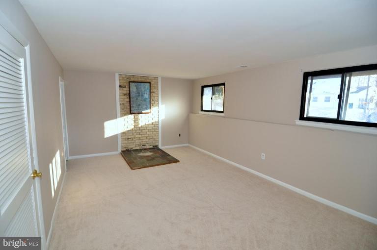 7914 Orange Plank Road Springfield, VA 22153 - Photo 8 of 9 an empty room with windows