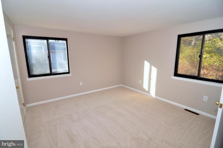 7914 Orange Plank Road Springfield, VA 22153 - Photo 9 of 9 a view of an empty room with a window
