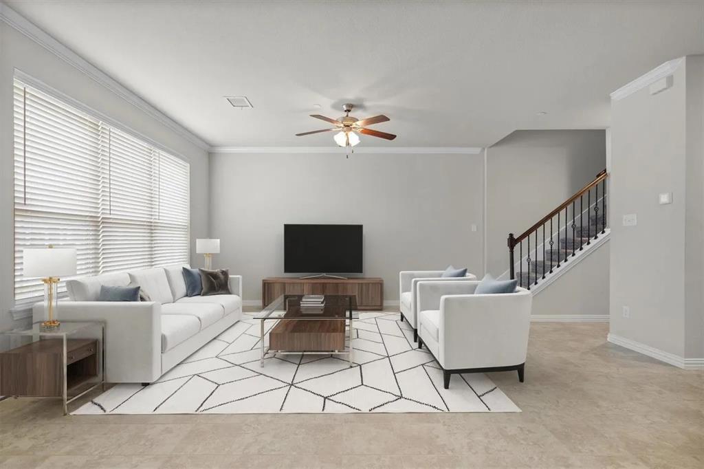 3300 Becker Drive Denton, TX 76207 - Photo 13 of 28 a living room with furniture a table and a chandelier