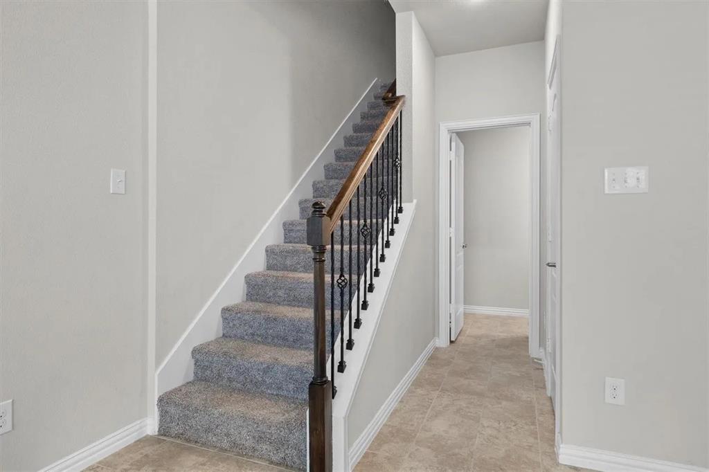 3300 Becker Drive Denton, TX 76207 - Photo 14 of 28 a view of a hallway with staircase