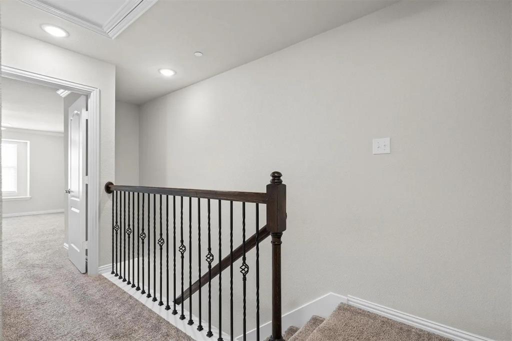 3300 Becker Drive Denton, TX 76207 - Photo 15 of 28 a view of a hallway with wooden floor
