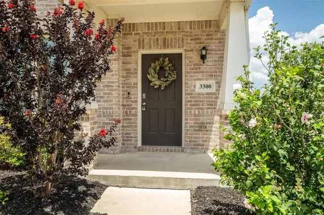 a front view of a house with a garage