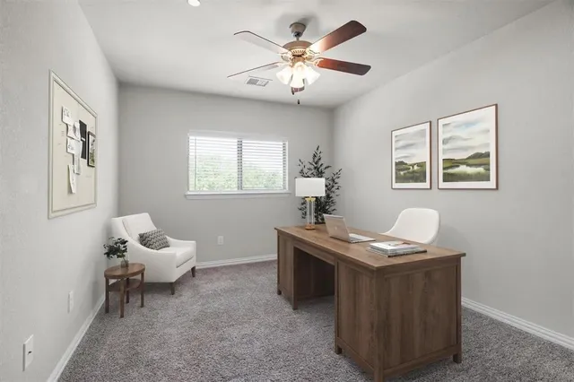 a living room with furniture and window