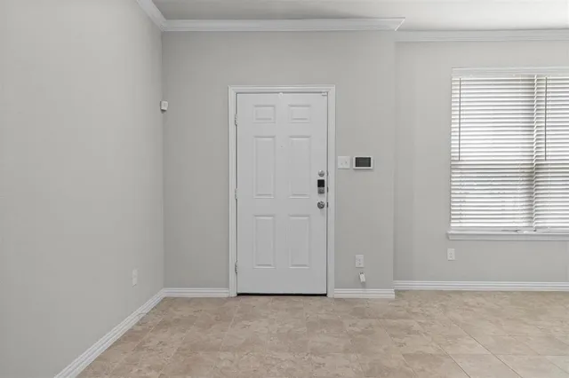 a view of an empty room with window