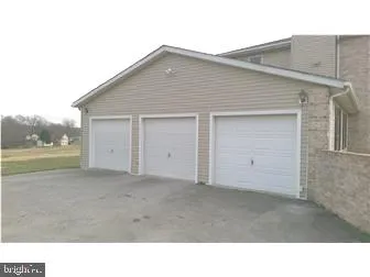 a black and white photo of a house