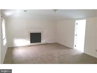 a open hall with a bench