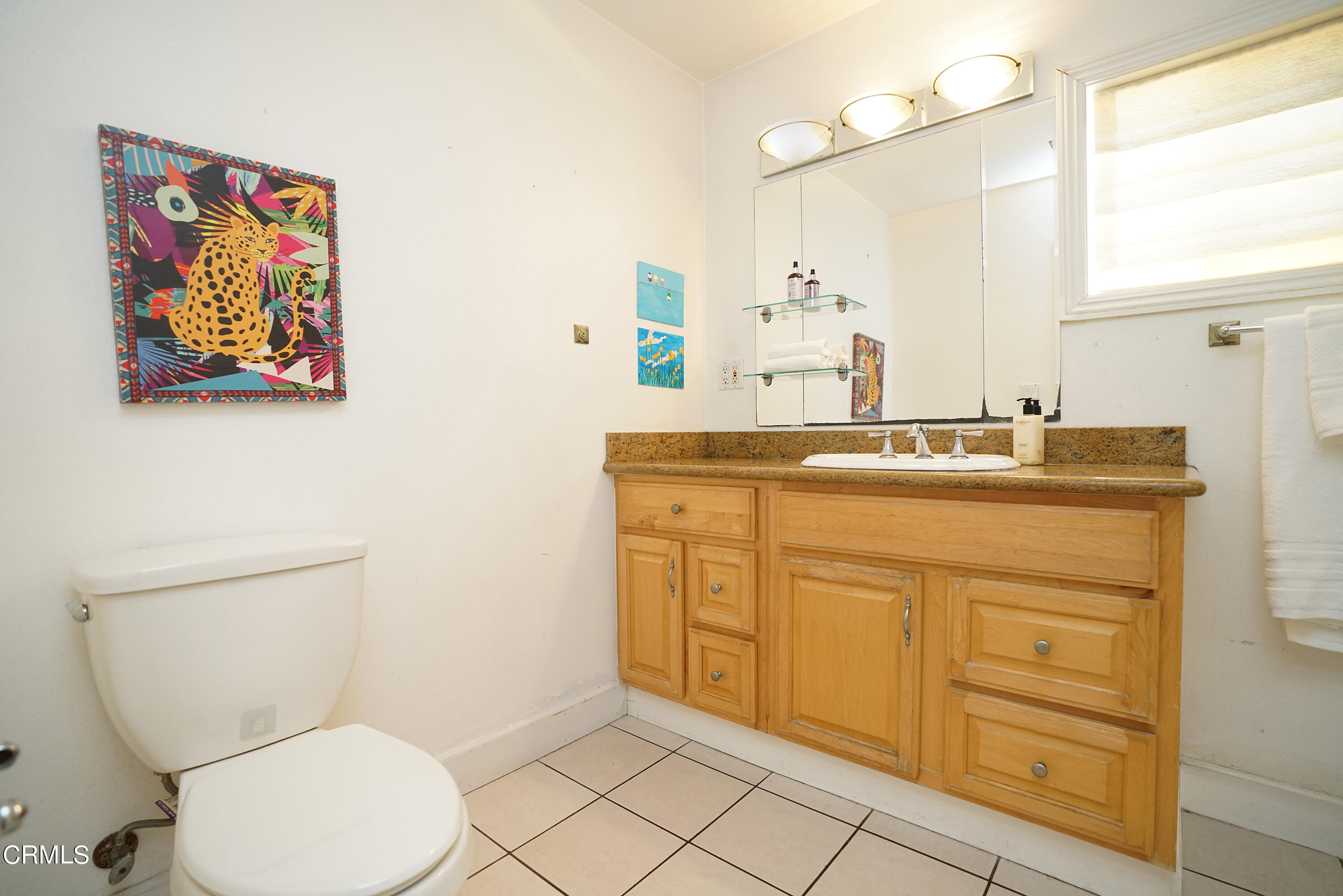 1739 Brigden Road Pasadena, CA 91104 - Photo 12 of 33 a bathroom with a granite countertop sink mirror vanity and toilet