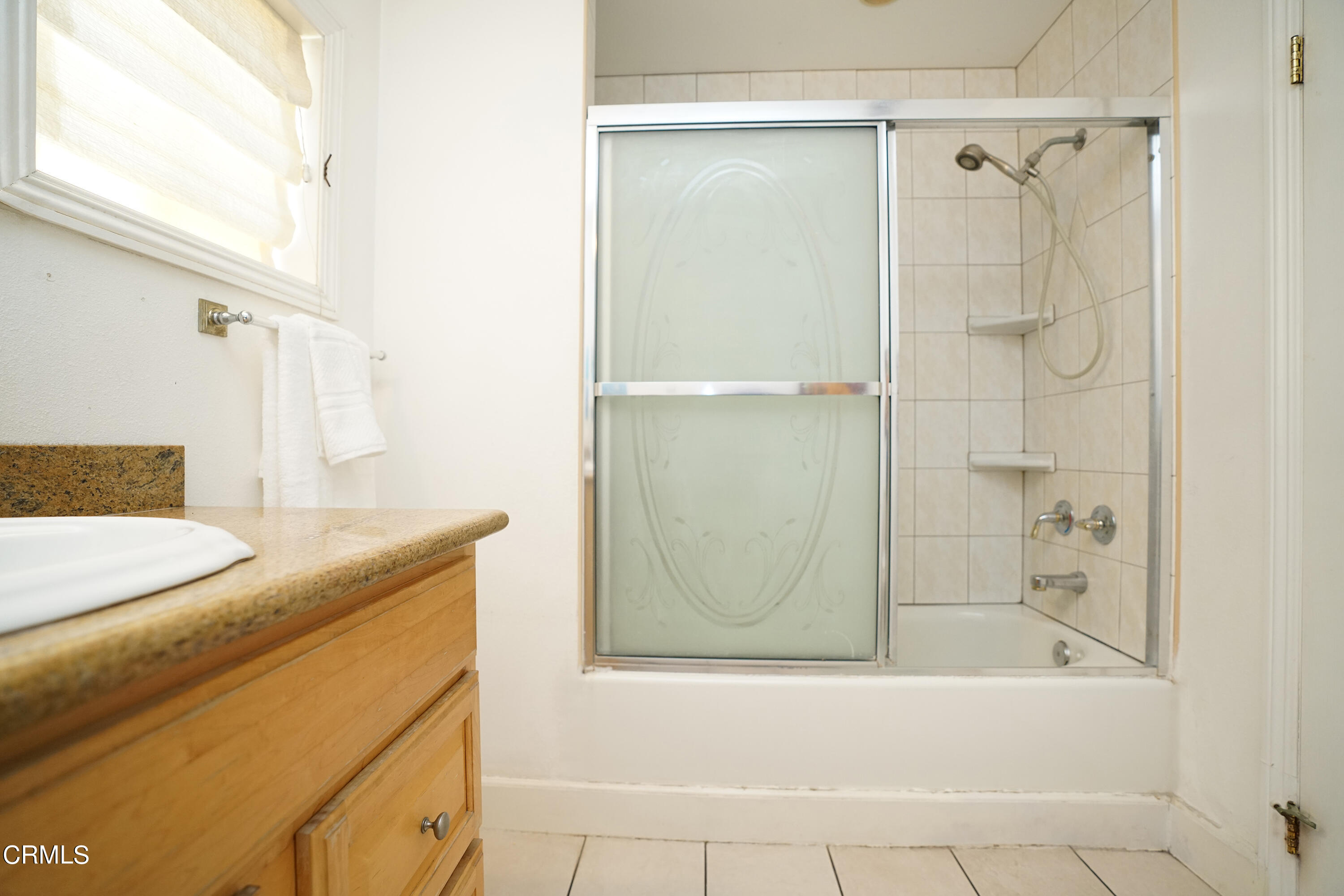 1739 Brigden Road Pasadena, CA 91104 - Photo 13 of 33 a bathroom with a bathtub and a shower