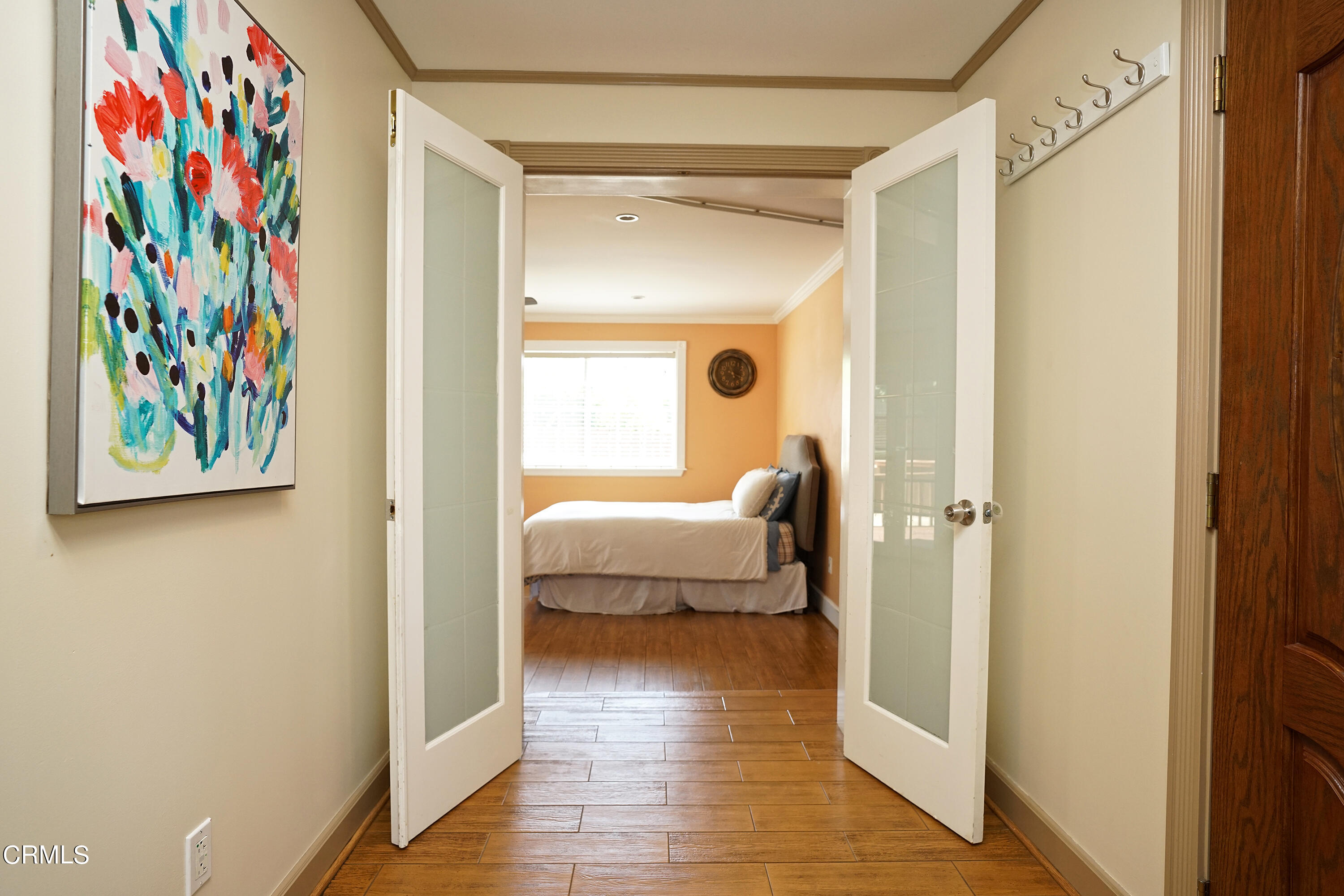 1739 Brigden Road Pasadena, CA 91104 - Photo 16 of 33 a bedroom with a bed and wooden floor