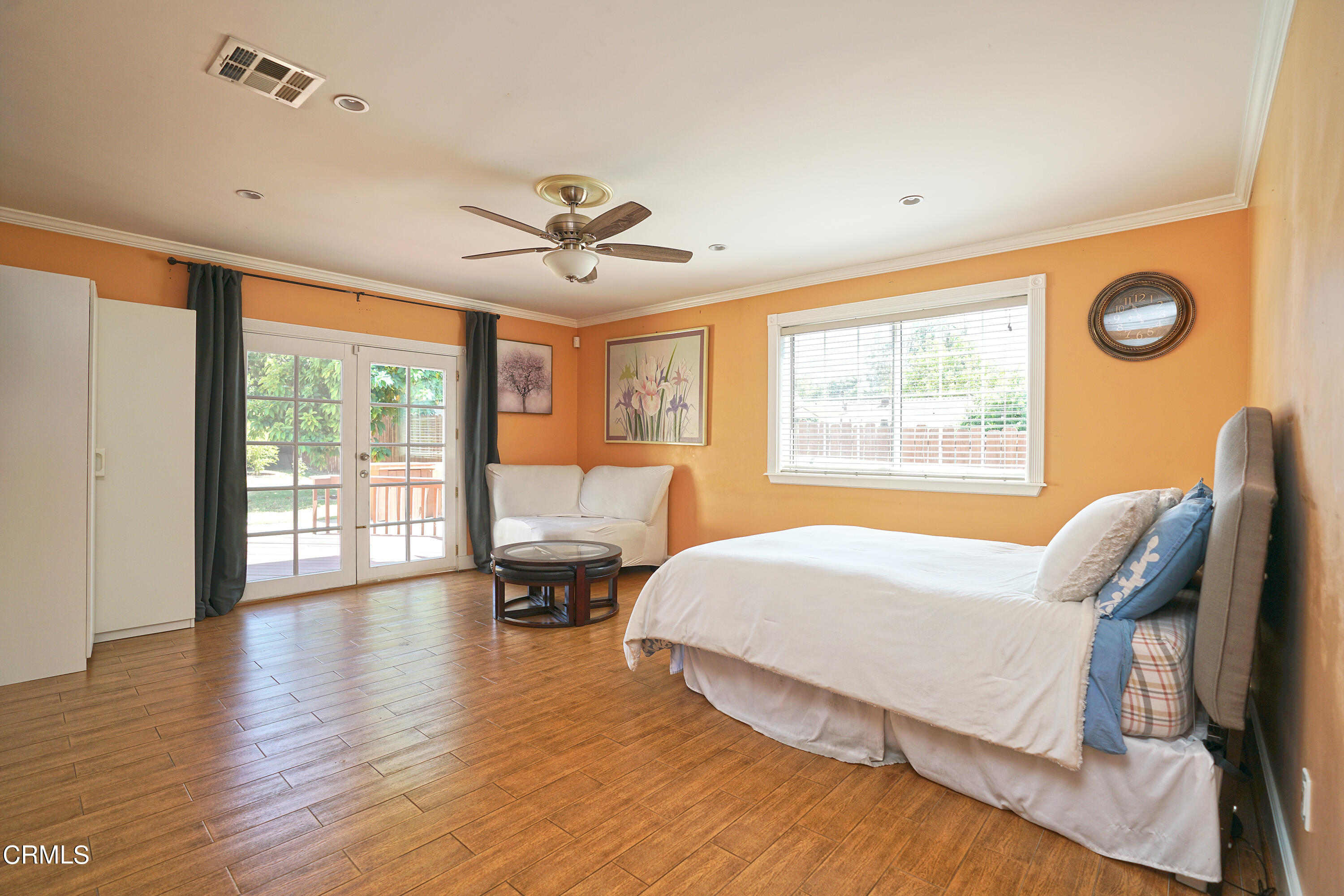 1739 Brigden Road Pasadena, CA 91104 - Photo 17 of 33 a bedroom with a bed and wooden floor