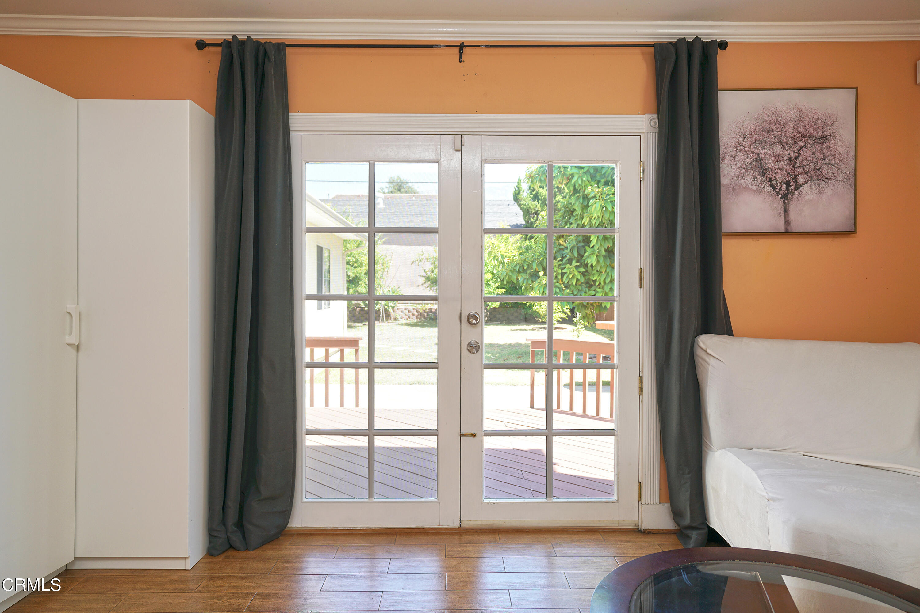 1739 Brigden Road Pasadena, CA 91104 - Photo 18 of 33 a view of an empty room with wooden floor and a window