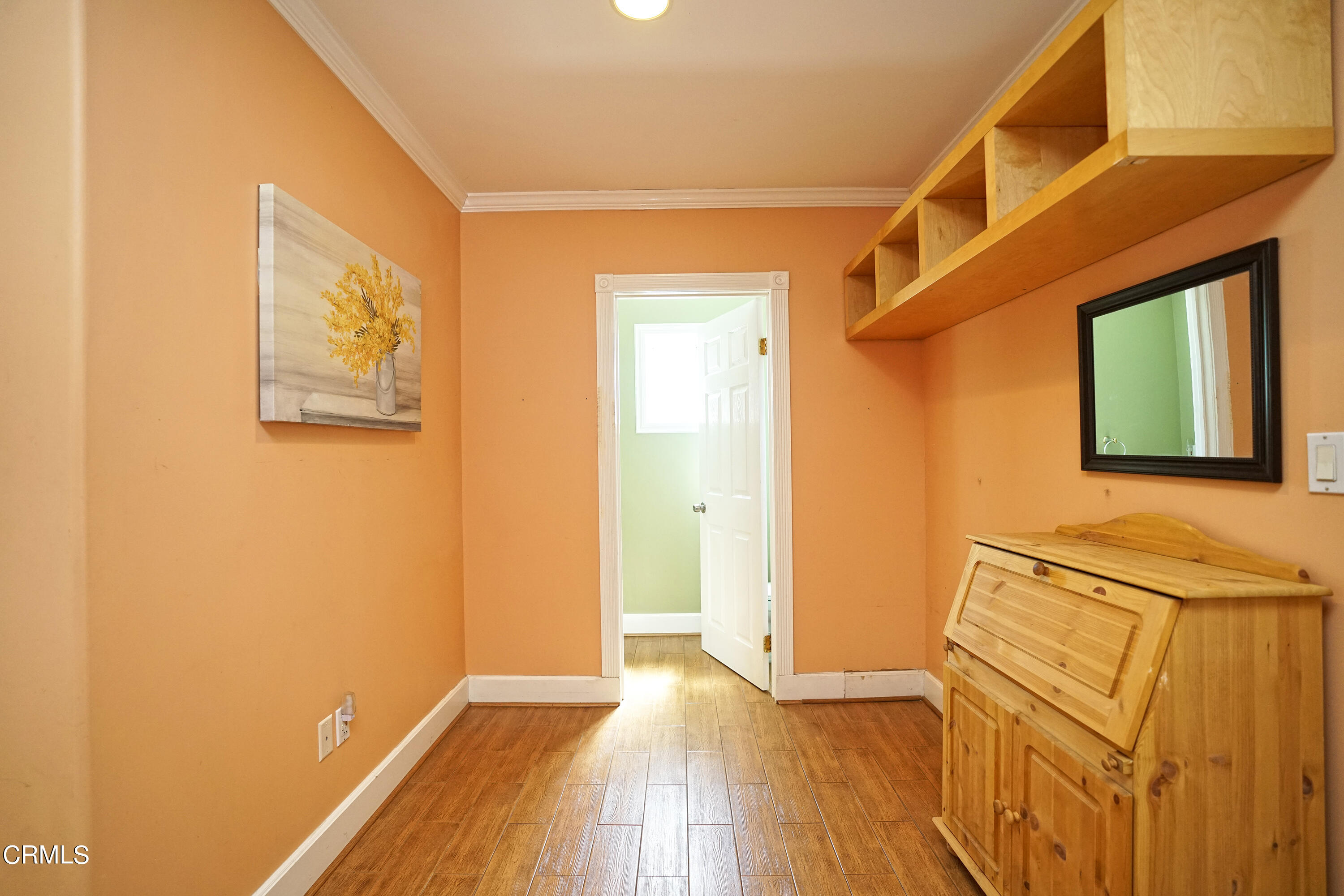 1739 Brigden Road Pasadena, CA 91104 - Photo 19 of 33 a view of a hallway with wooden floor and a bathroom