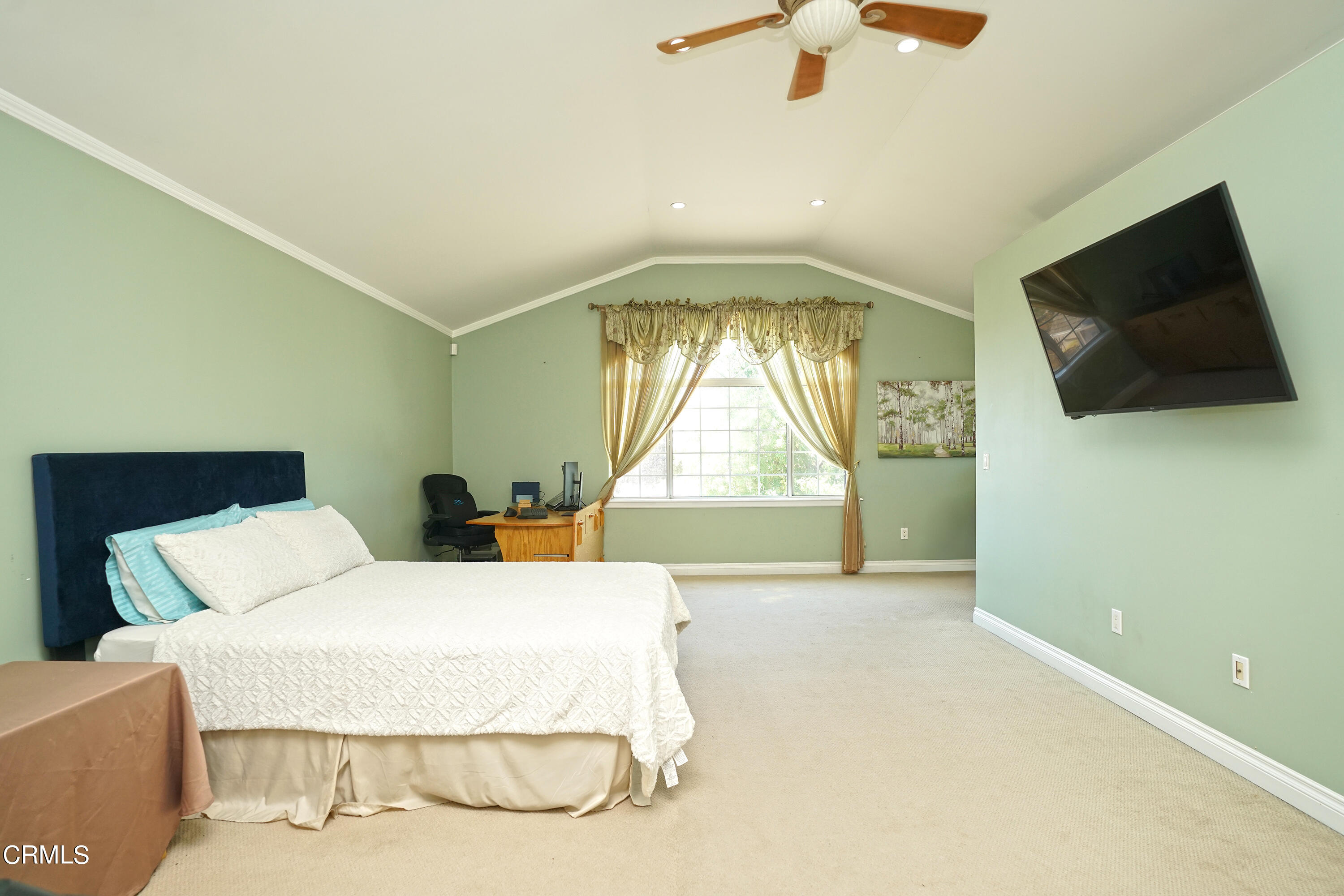 1739 Brigden Road Pasadena, CA 91104 - Photo 20 of 33 a bedroom with a bed and a flat screen tv