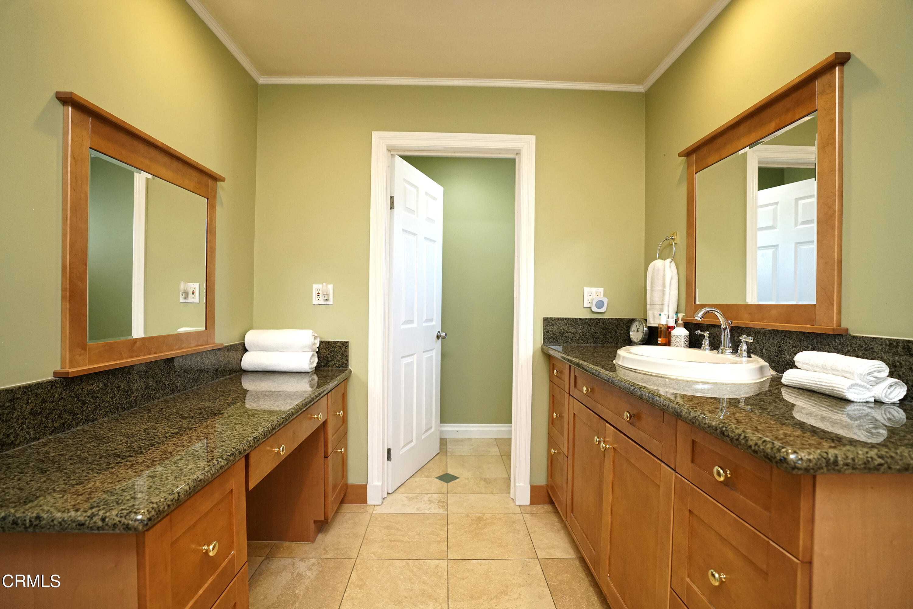 1739 Brigden Road Pasadena, CA 91104 - Photo 22 of 33 a spacious bathroom with a granite countertop sink and a mirror