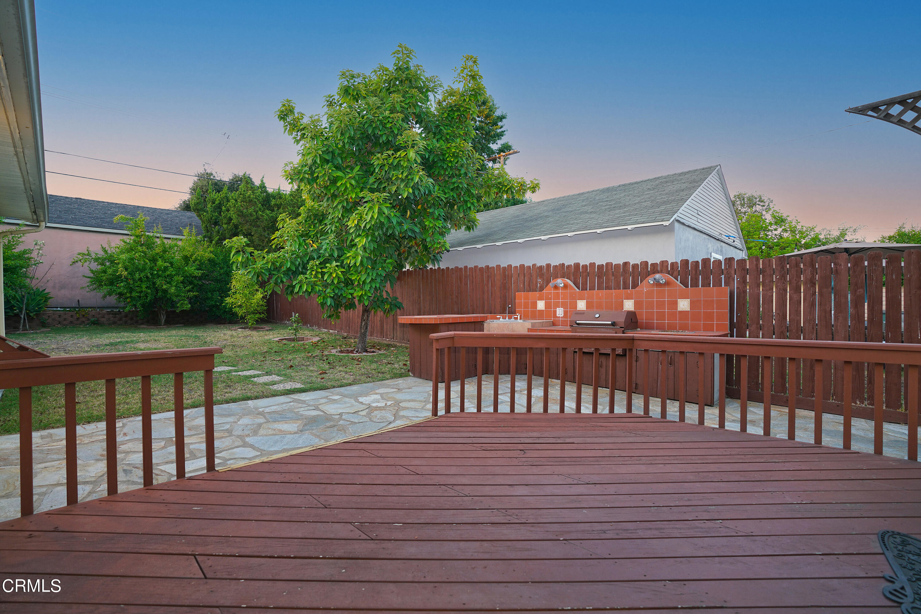 1739 Brigden Road Pasadena, CA 91104 - Photo 27 of 33 a view of a wooden deck with a yard