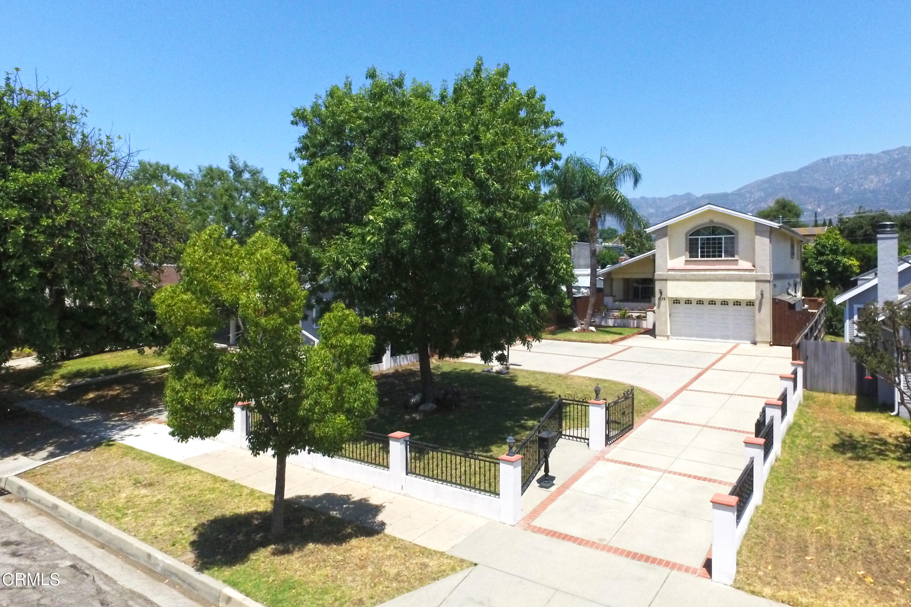 1739 Brigden Road Pasadena, CA 91104 - Photo 32 of 33 a view of a house with a yard