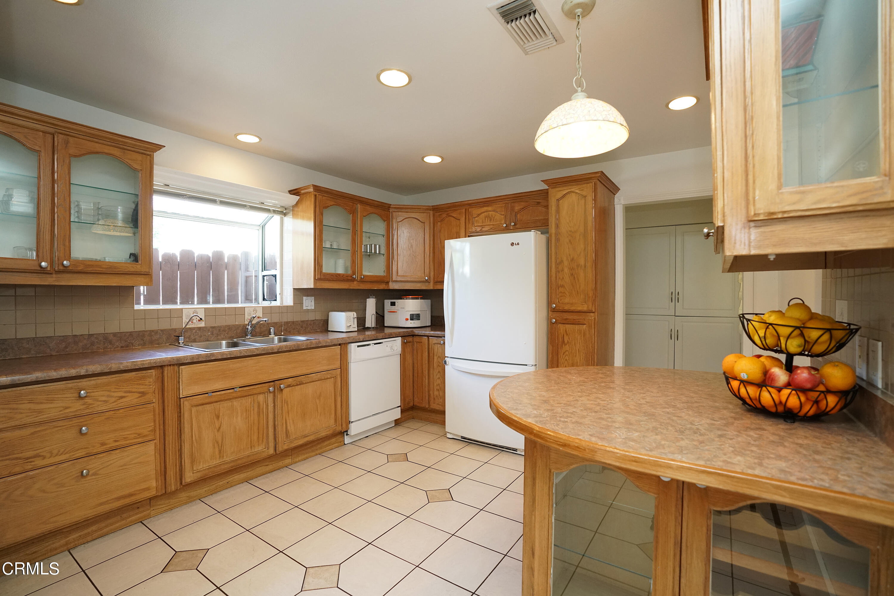1739 Brigden Road Pasadena, CA 91104 - Photo 9 of 33 a kitchen with granite countertop cabinets and stainless steel appliances