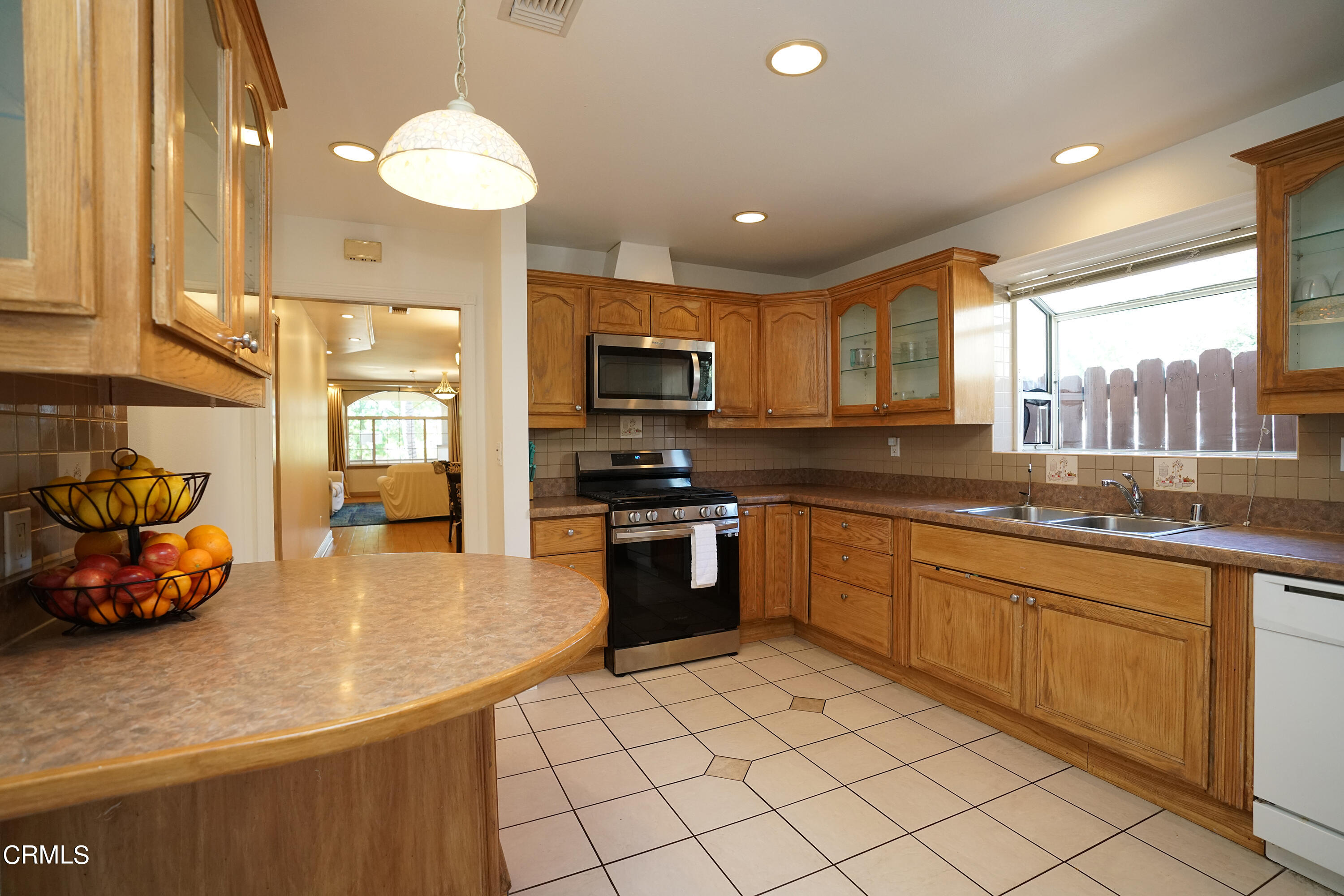 1739 Brigden Road Pasadena, CA 91104 - Photo 10 of 33 a kitchen with stainless steel appliances granite countertop a sink and a stove