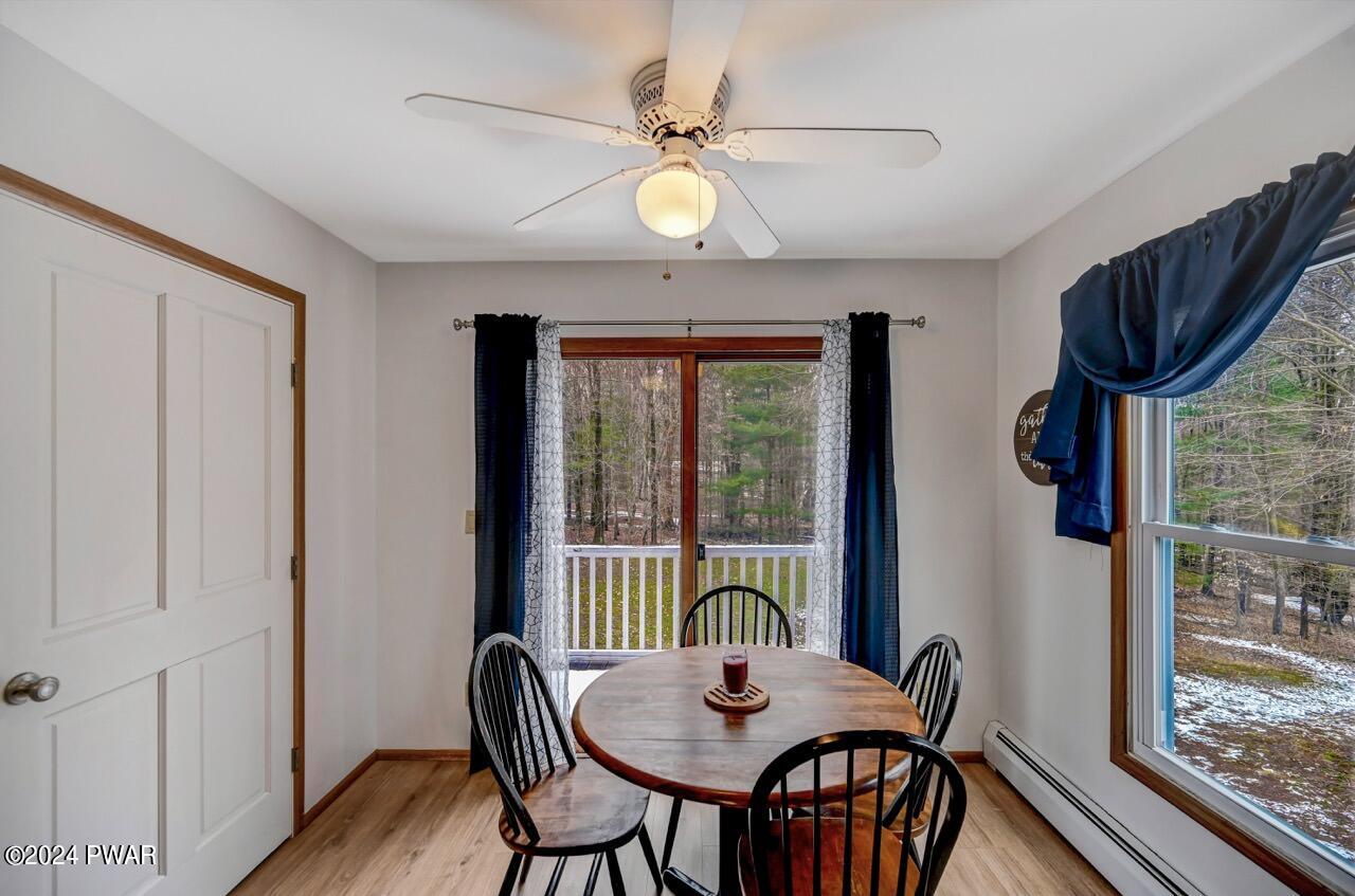 19 Ripple Lane Beach Lake, PA 18405 - Photo 21 of 52 a view of a dining room with furniture window and wooden floor