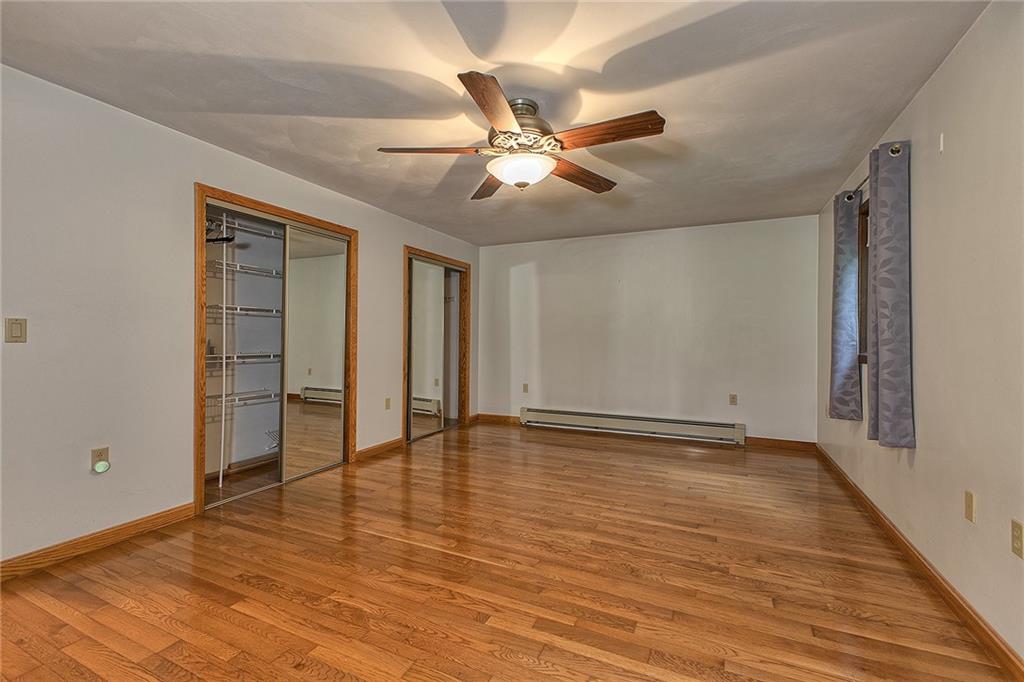 18 Rhea Road Indiana, PA 15701 - Photo 13 of 39 wooden floor in an empty room with a window