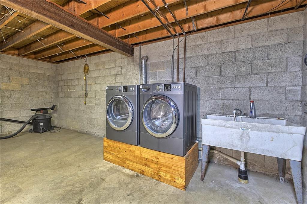 18 Rhea Road Indiana, PA 15701 - Photo 19 of 39 a utility room with dryer and washer