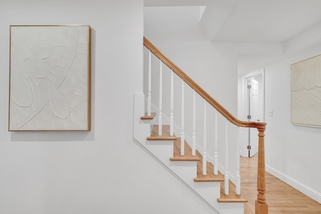 295 Beacon Street, Unit 2 Boston, MA 02116 - Photo 14 of 29 a view of staircase with wooden floor and staircase