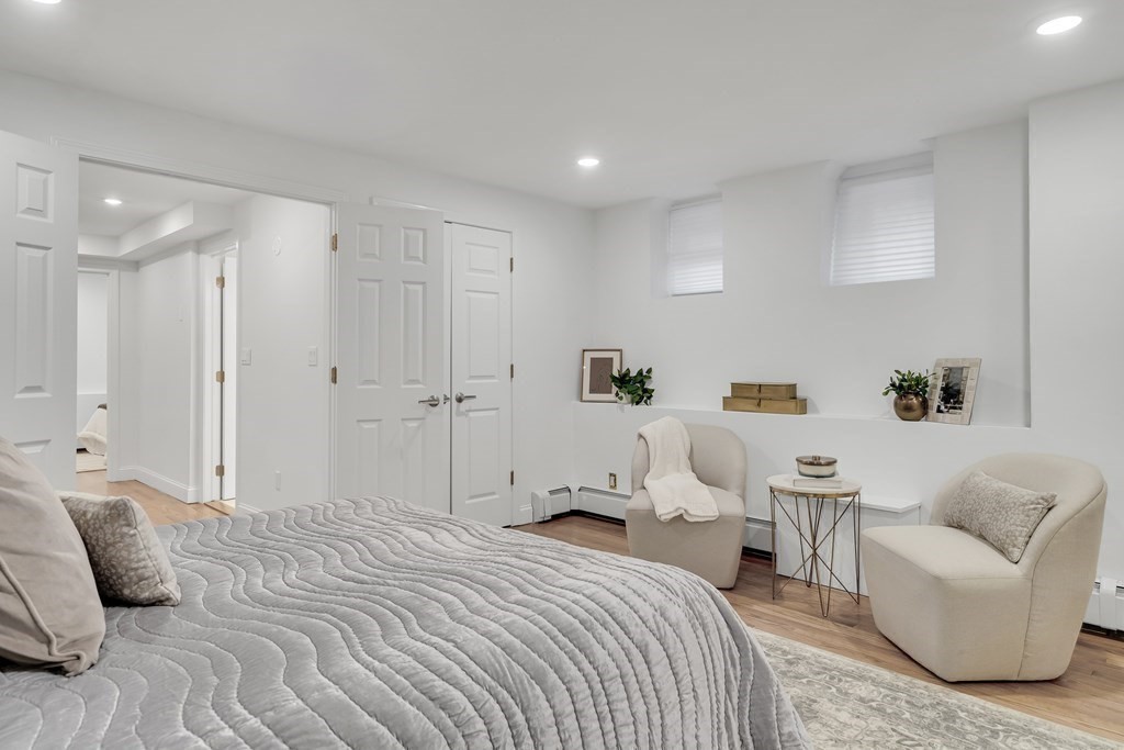 295 Beacon Street, Unit 2 Boston, MA 02116 - Photo 16 of 29 a bedroom with a white bed and white walls
