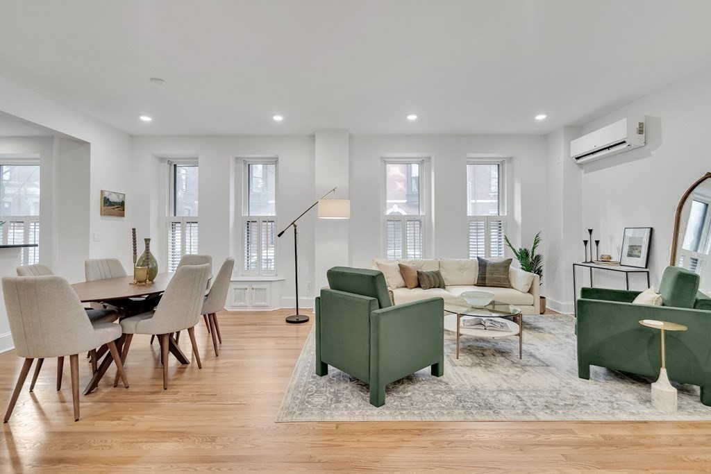 295 Beacon Street, Unit 2 Boston, MA 02116 - Photo 8 of 29 a living room with furniture and a wooden floor