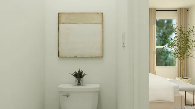 a bathroom with a sink a mirror and a toilet
