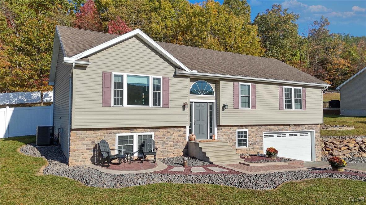 259 Owl Creek Road Tamaqua, PA 18252 - Photo 1 of 50 a view of a house with a yard and sitting area