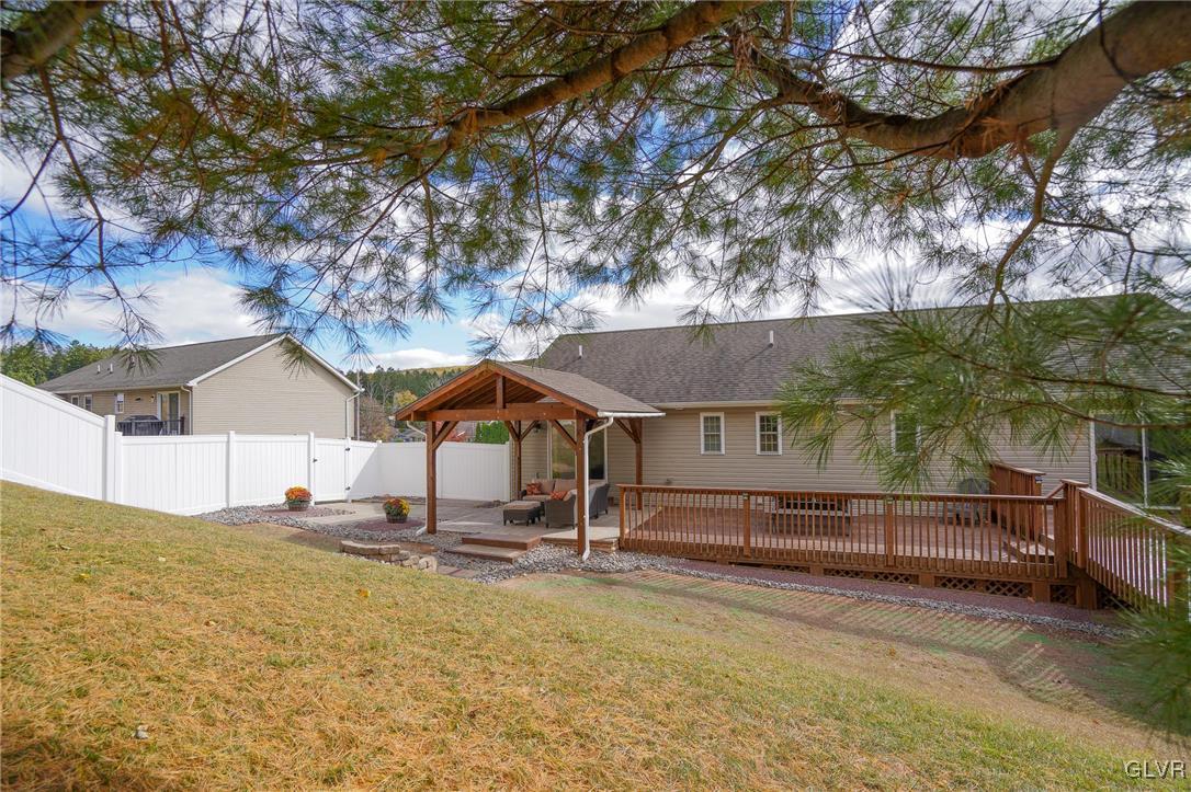 259 Owl Creek Road Tamaqua, PA 18252 - Photo 35 of 50 a view of a house with large tree and wooden fence