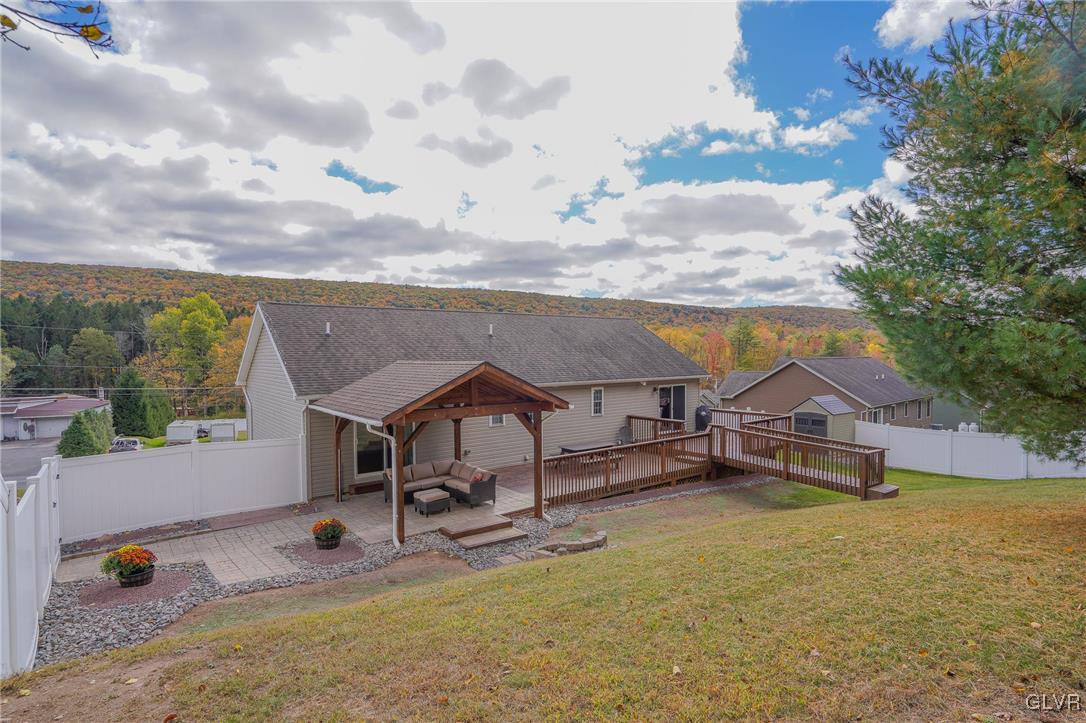259 Owl Creek Road Tamaqua, PA 18252 - Photo 37 of 50 an aerial view of a house with swimming pool garden and trees