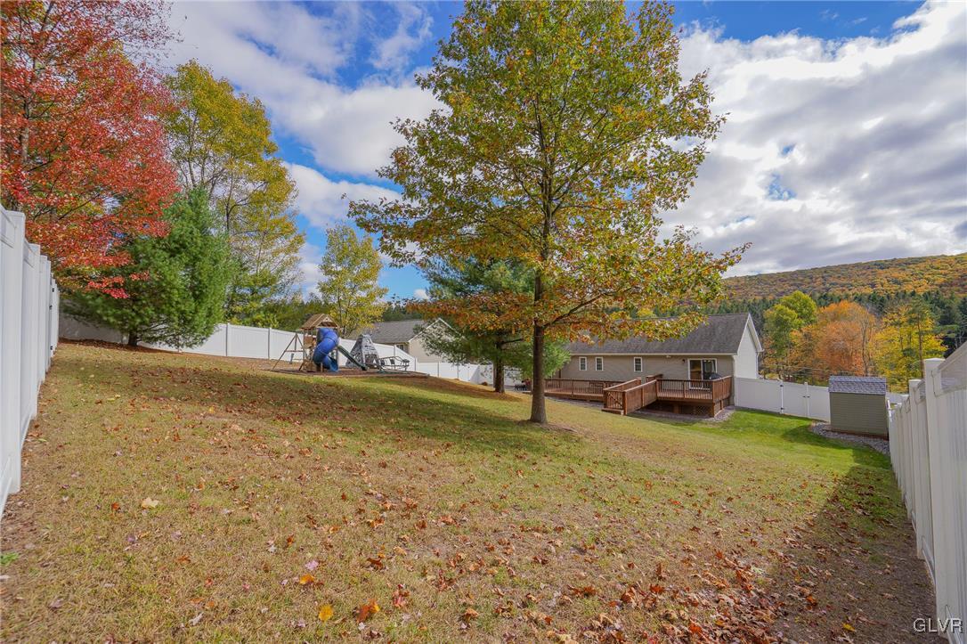 259 Owl Creek Road Tamaqua, PA 18252 - Photo 39 of 50 a view of a yard with swimming pool and sitting area