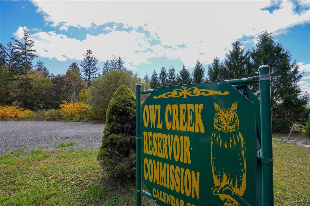 259 Owl Creek Road Tamaqua, PA 18252 - Photo 42 of 50 a sign that is on the side of the river