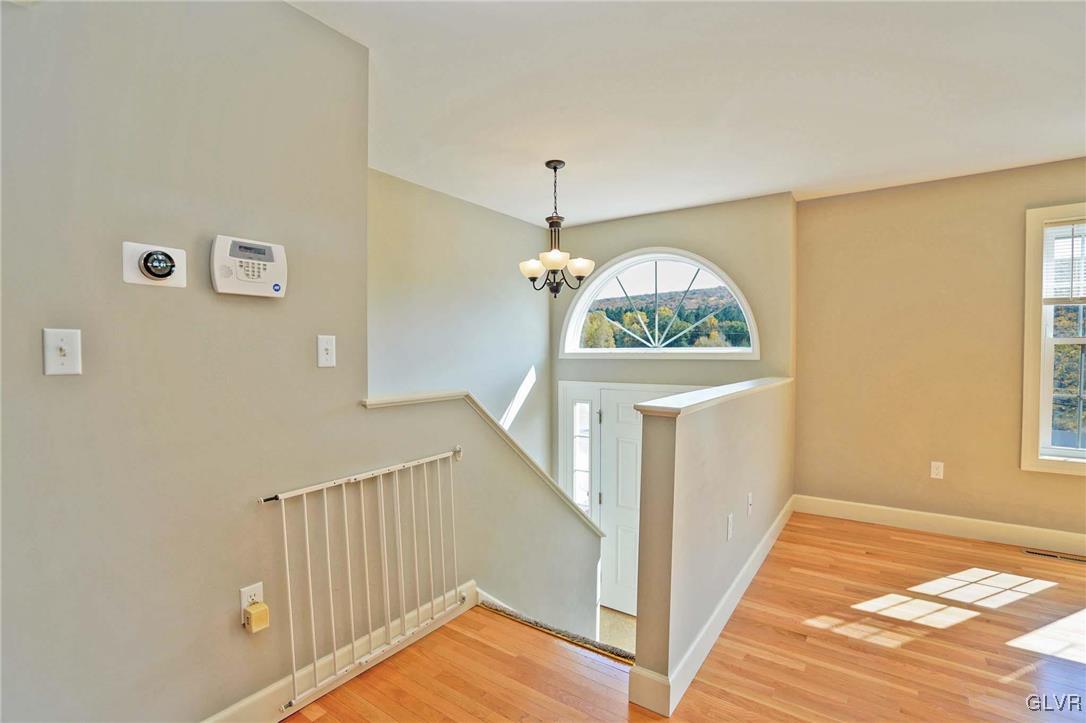 259 Owl Creek Road Tamaqua, PA 18252 - Photo 6 of 50 a view of a hallway with entryway wooden floor and front door