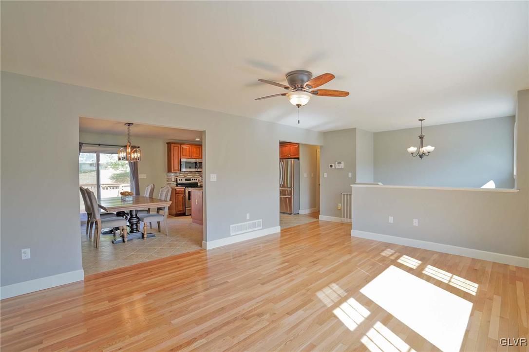 259 Owl Creek Road Tamaqua, PA 18252 - Photo 8 of 50 wooden floor in an empty room with a window