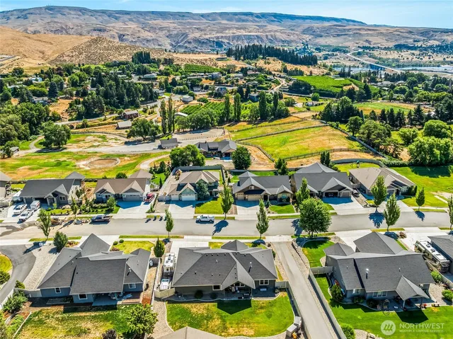 a large kitchen with granite countertop a large counter top covered in it