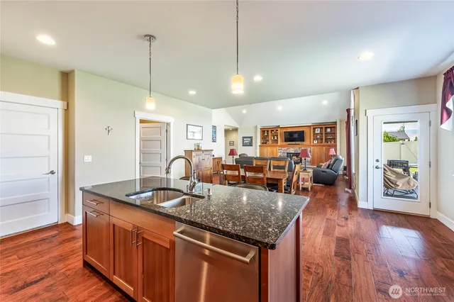 a living room with furniture and a rug