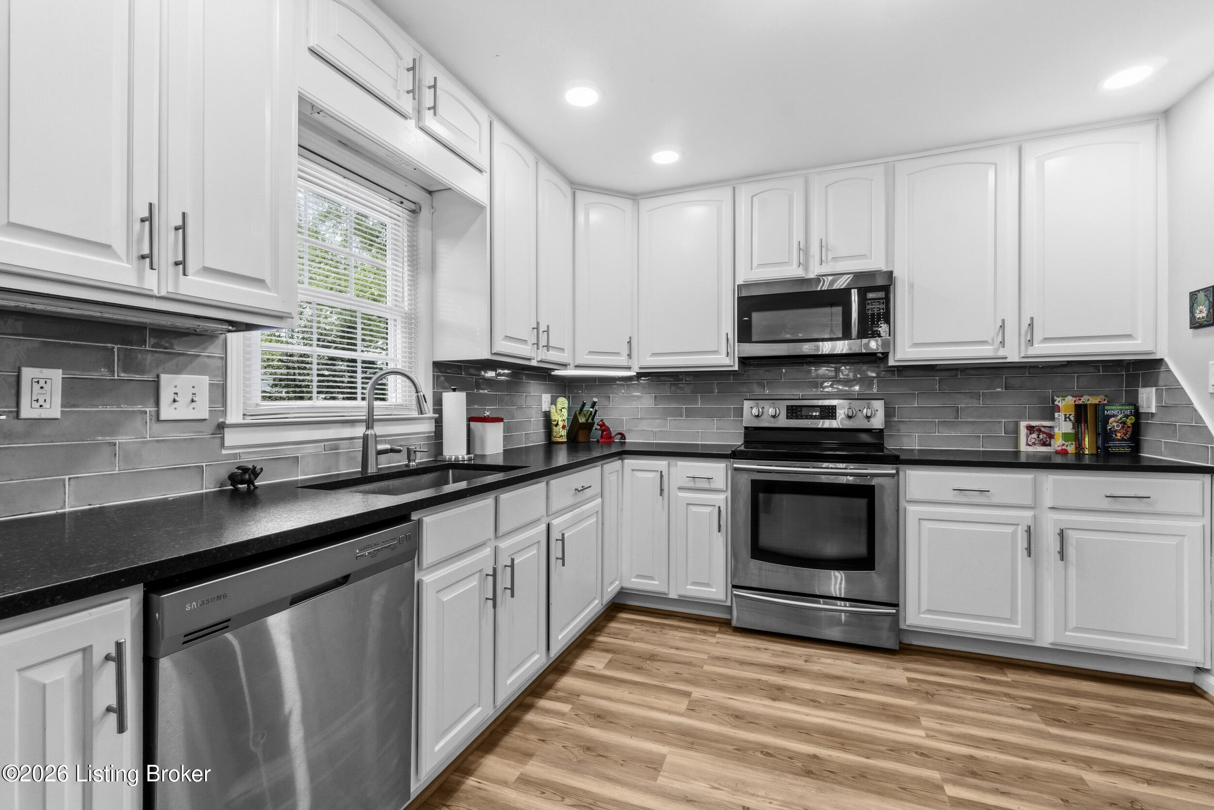 6700 Tottenham Road Louisville, KY 40207 - Photo 9 of 45 Updated kitchen cabinets, granite countertops
