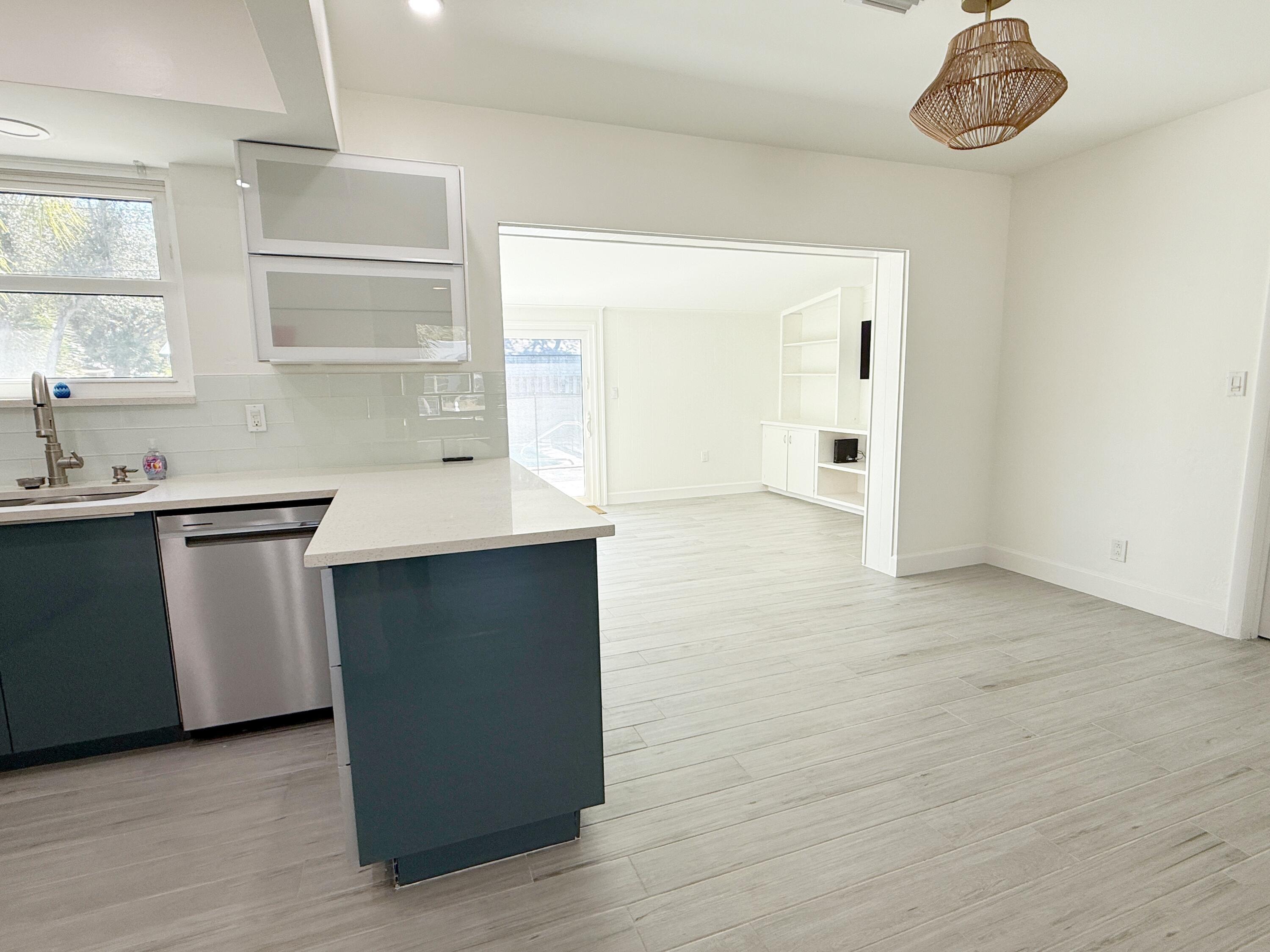 16 Ridgewood Circle Tequesta, FL 33469 - Photo 8 of 25 Kithen and Additional Living