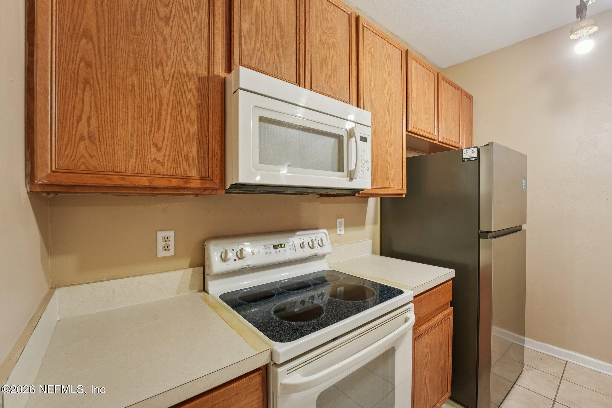 7990 Baymeadows Road East, Unit 1001 Jacksonville, FL 32256 - Photo 12 of 26 12-web-or-mls-Baymeadows Rd-S0602-012