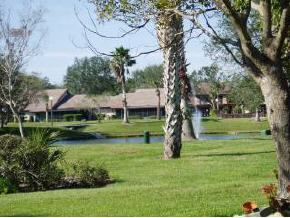 823 Northeast Brae, Unit 5 Palm Bay, FL 32905 - Photo 2 of 4 a view of a garden
