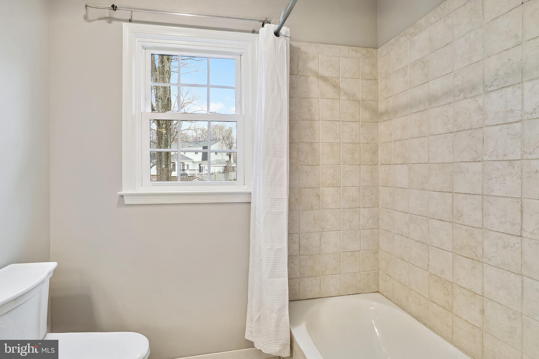 3416 Valewood Drive Oakton, VA 22124 - Photo 35 of 57 a bathroom with a toilet and shower