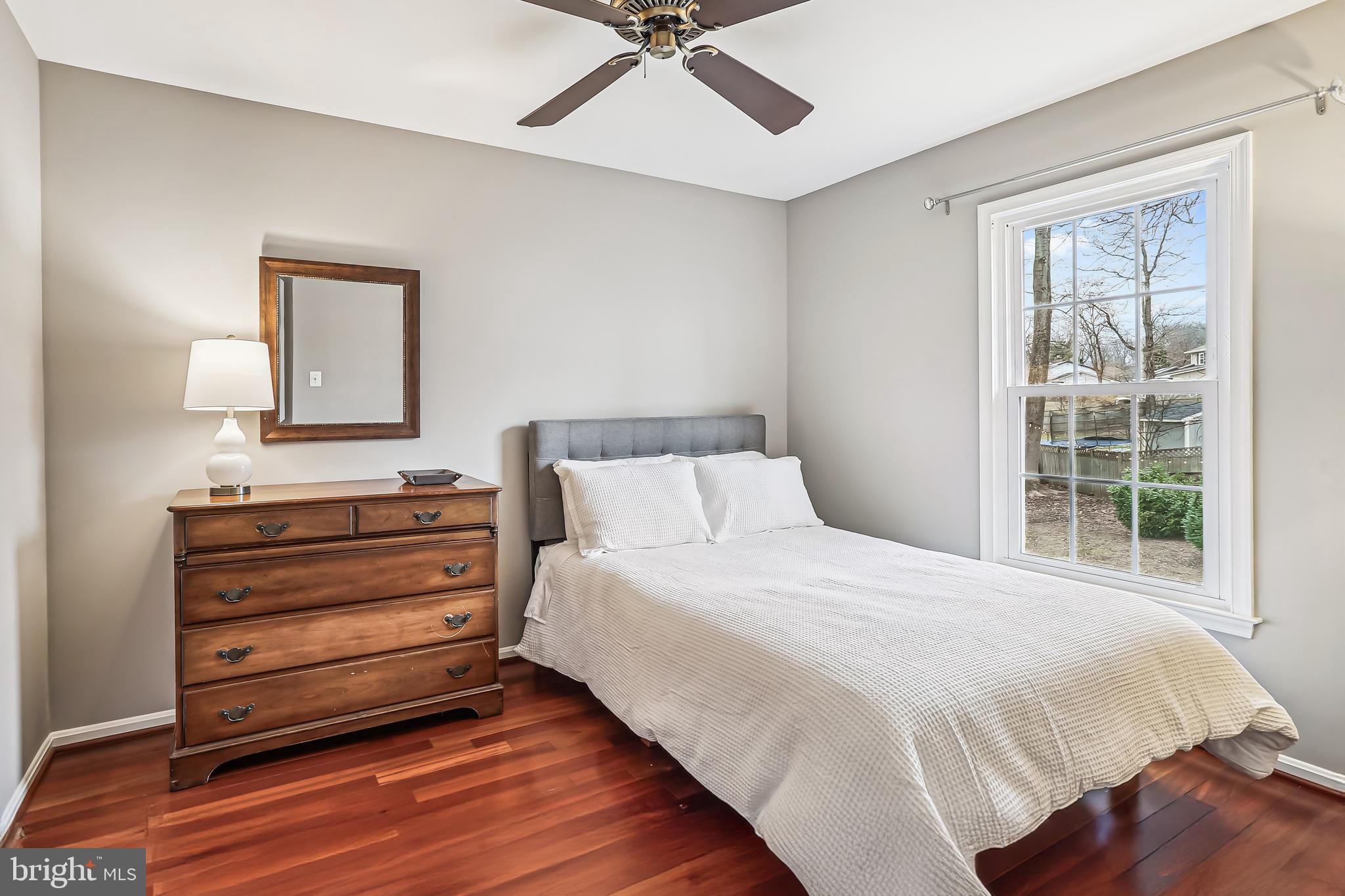 3416 Valewood Drive Oakton, VA 22124 - Photo 36 of 57 a bedroom with a bed and a window