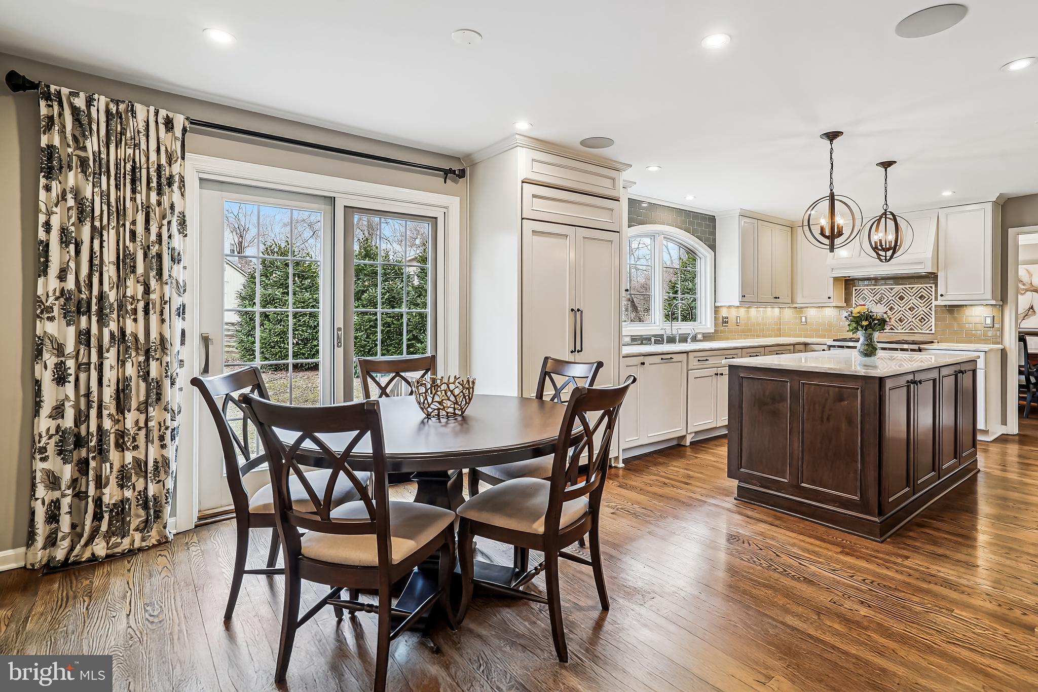 3416 Valewood Drive Oakton, VA 22124 - Photo 5 of 57 a view of a dining room with furniture window and wooden floor