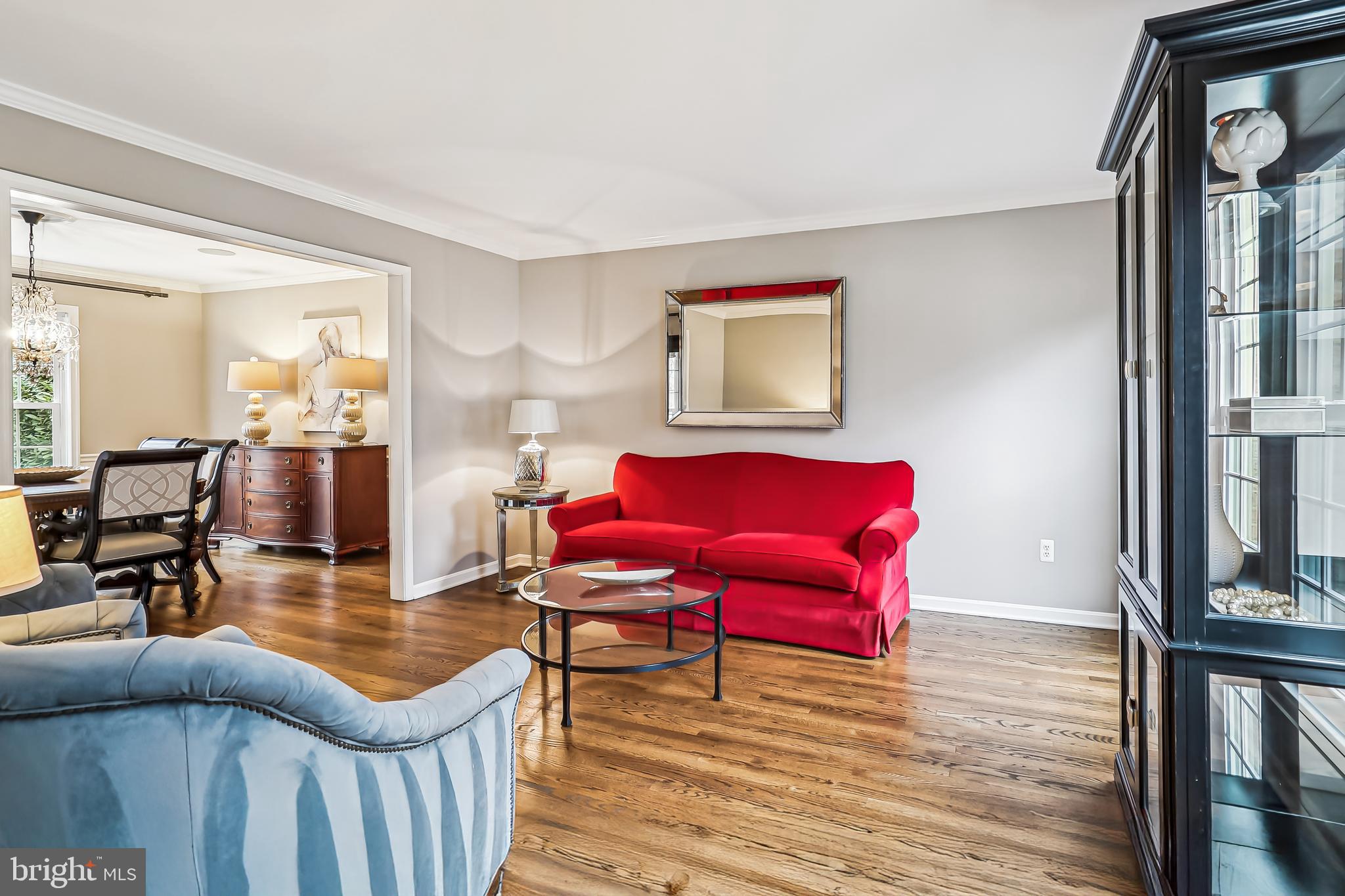 3416 Valewood Drive Oakton, VA 22124 - Photo 8 of 57 a living room with furniture a flat screen tv and a table