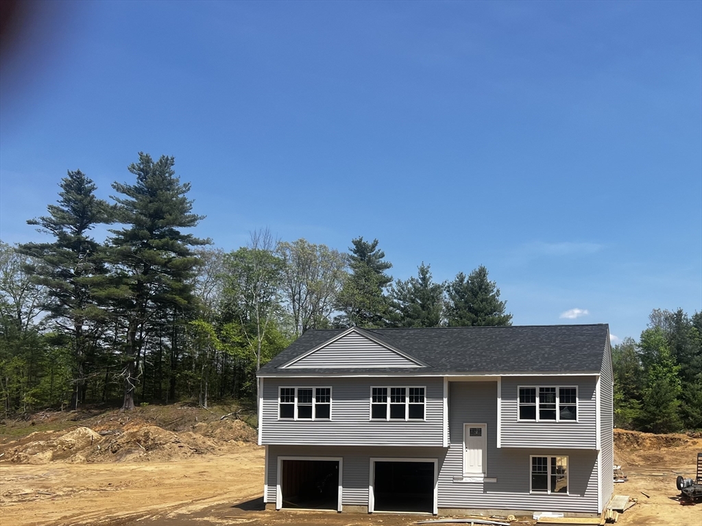940 Old West Brookfield Road Warren, MA 01083 - Photo 3 of 4 a front view of a house with a yard