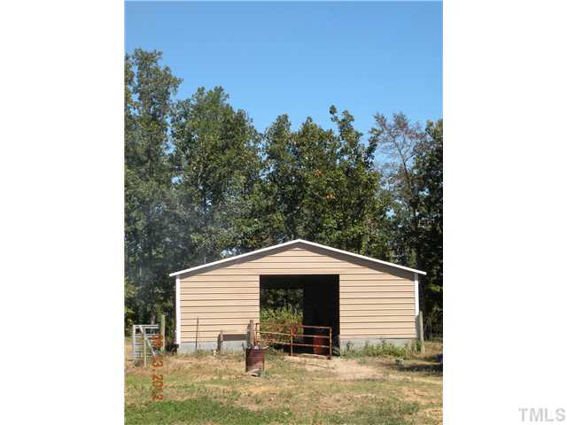 Lot 1 Silas Hayes Road, Unit 1 Angier, NC 27501 - Photo 14 of 21 a front view of a house with a yard
